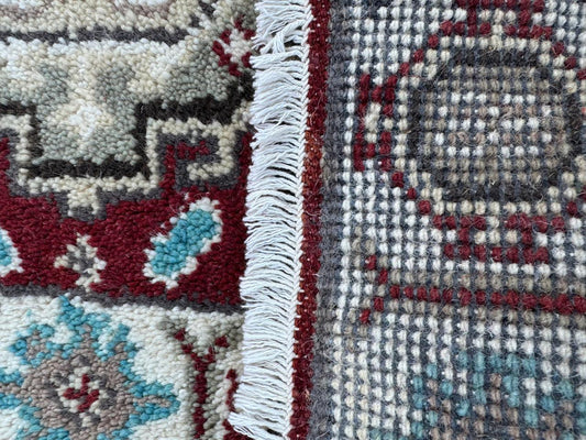 83003 Kazak- indiano 0,63x0,87= 0,55
